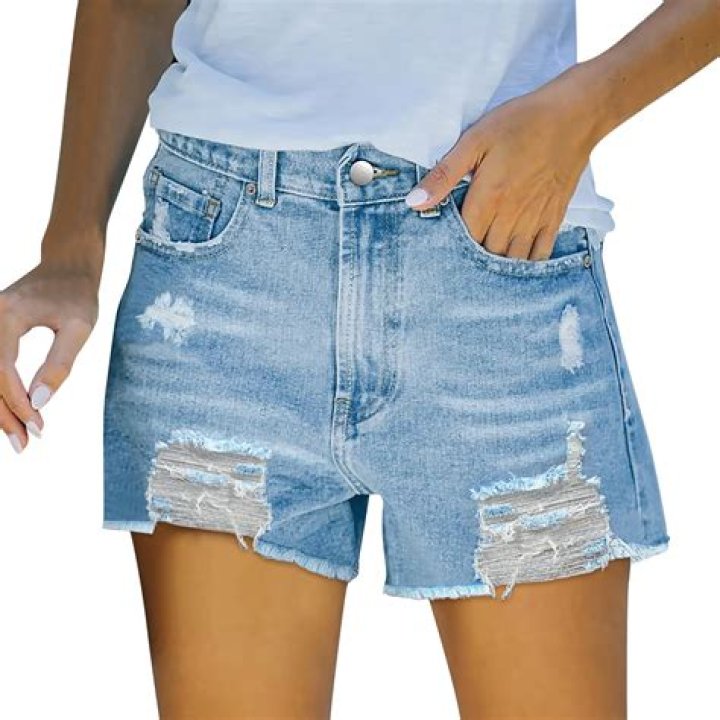 Uncover The Significance Of Dominican Singer Nfasis's Torn Denim Shorts